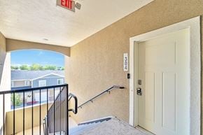 Magna apartment for rent - A white door with a black handle is on the right side of the image.