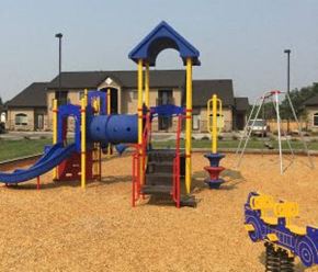 Emmett apartment for rent - a playground with a slide and monkey bars