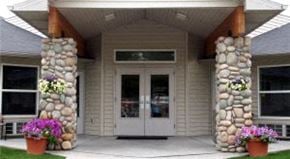 Emmett apartment for rent - a building with a white door and two stone pillars
