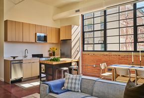 Detroit apartment for rent - A kitchen with a dining table and chairs is shown.