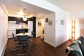 Detroit apartment for rent - A kitchen with a table and chairs.