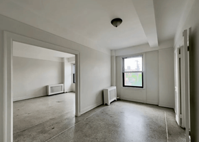 Detroit apartment for rent - A room with a window and a television set.