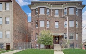 Detroit apartment for rent - A brick building with a tree in front of it.