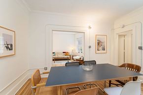 Detroit apartment for rent - A dining room with a table and chairs.