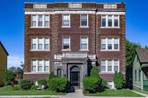 Detroit apartment for rent - A red brick building with the word "MAYOR" on the front.