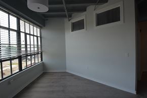 Union City apartment for rent - a living room with a large window and white walls