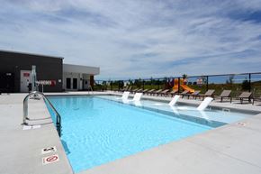 Indianapolis apartment for rent - Swimming pool with chairs at The Landing Apartments, Avon, Indiana
