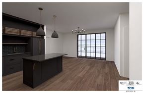 Philadelphia apartment for rent - A modern kitchen with dark wood floors and a large island.