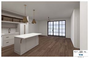 Philadelphia apartment for rent - A kitchen with a white island and wooden floors.