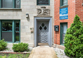 Chicago apartment for rent - A building with a grey door and a number 4606 on it.