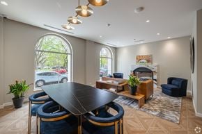 Chicago apartment for rent - A modern dining room with a large table and chairs.