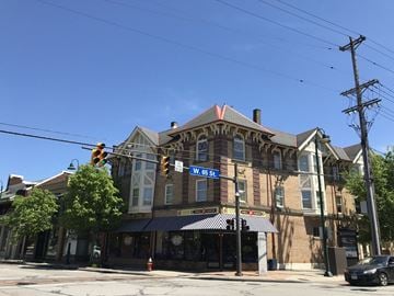 Cleveland apartment for rent - a building on the corner of a street with a traffic light