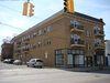 Cleveland apartment for rent - a building on the corner of a street with a traffic light