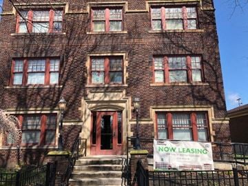 Cleveland apartment for rent - a building with a now leasing sign in front of it