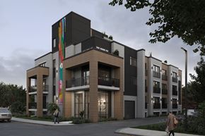 Ottawa apartment for rent - A modern apartment building with a person walking in front.