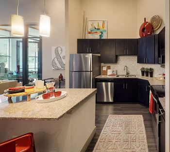 Fully furnished kitchen with stainless steel appliances