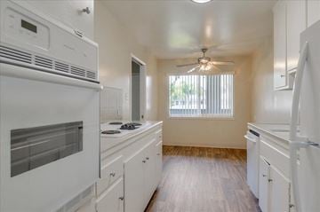 Menlo Park apartment for rent - a kitchen with a stove and a ceiling fan