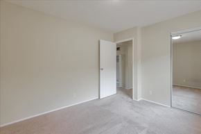 Menlo Park apartment for rent - a bedroom with a large mirror and carpeted floor