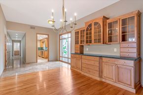 Los Gatos apartment for rent - a kitchen with wood floors and cabinets and a chandelier