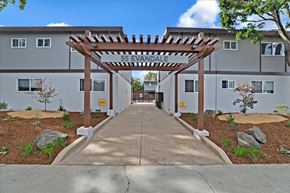Mountain View apartment for rent - A building with a sign that says 55 Evandale.