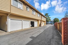 Mountain View apartment for rent - A row of garages and driveways.