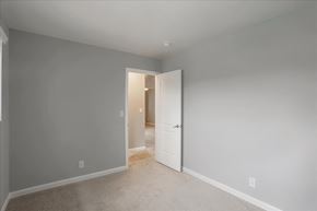 Mountain View apartment for rent - A room with a white door and carpeted floor.