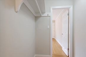 Menlo Park apartment for rent - A white door is open to a hallway.