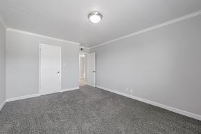 San Mateo apartment for rent - A room with a grey carpet and white walls.
