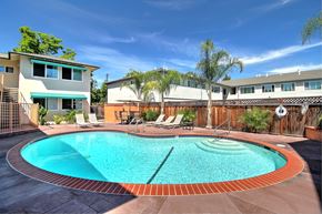 Menlo Park apartment for rent - a swimming pool with a house in the background