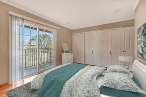 Los Gatos apartment for rent - a bedroom with a bed and a sliding glass door