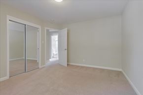 Menlo Park apartment for rent - A room with a sliding glass door and carpeted floor.