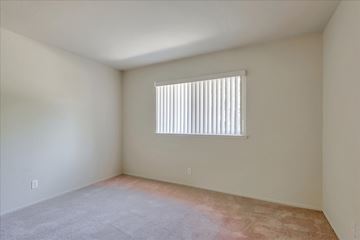 Menlo Park apartment for rent - a spacious living room with a window and carpet