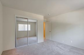 Menlo Park apartment for rent - A room with a white wall and a carpeted floor.