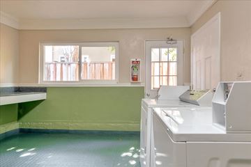 Menlo Park apartment for rent - a kitchen with a washer and dryer and a window