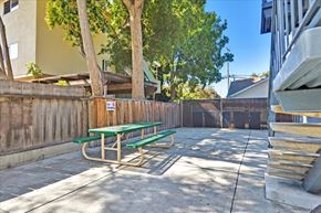 Redwood City apartment for rent - a picnic table in the back yard of a house
