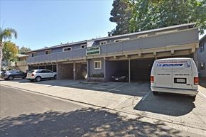 Menlo Park apartment for rent - A white van is parked in front of a building with a sign that reads