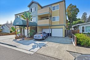 Redwood City apartment for rent - the building with a car parked in front of it