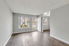 San Jose apartment for rent - A room with a window and a door.