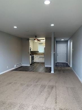 Sunnyvale apartment for rent - A room with a carpeted floor and a ceiling fan.