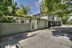 Menlo Park apartment for rent - A house with a driveway and a gate.