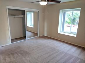 Mountain View apartment for rent - an empty living room with a closet and a window
