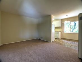 Menlo Park apartment for rent - A room with a carpeted floor and a window.