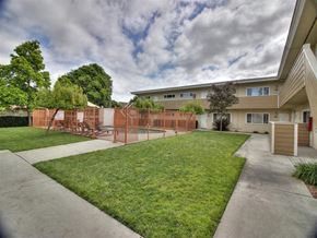 Mountain View apartment for rent - a yard in front of a house with a fence