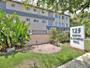 San Mateo apartment for rent - an apartment building with a sign in front of it