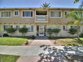 Sunnyvale apartment for rent - The image shows the front of a building with the number 520 and a sign that reads