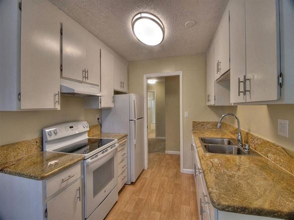 Sunnyvale apartment for rent - Fully Equipped Kitchen Includes Frost-Free Refrigerator, Electric Range, & Dishwasher at Balboa Apartments, Sunnyvale, 94086