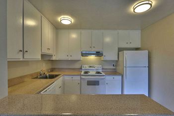 Kitchen with cabinets and cupboards