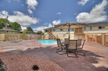 Pool side sitting area with beautiful skyline view