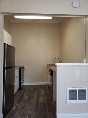 Mountain View apartment for rent - A kitchen with a refrigerator, oven, and sink.