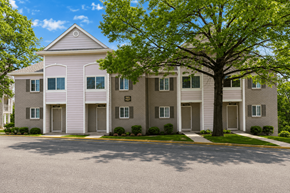 Kansas City apartment for rent - Townhouse with trees in front of it.